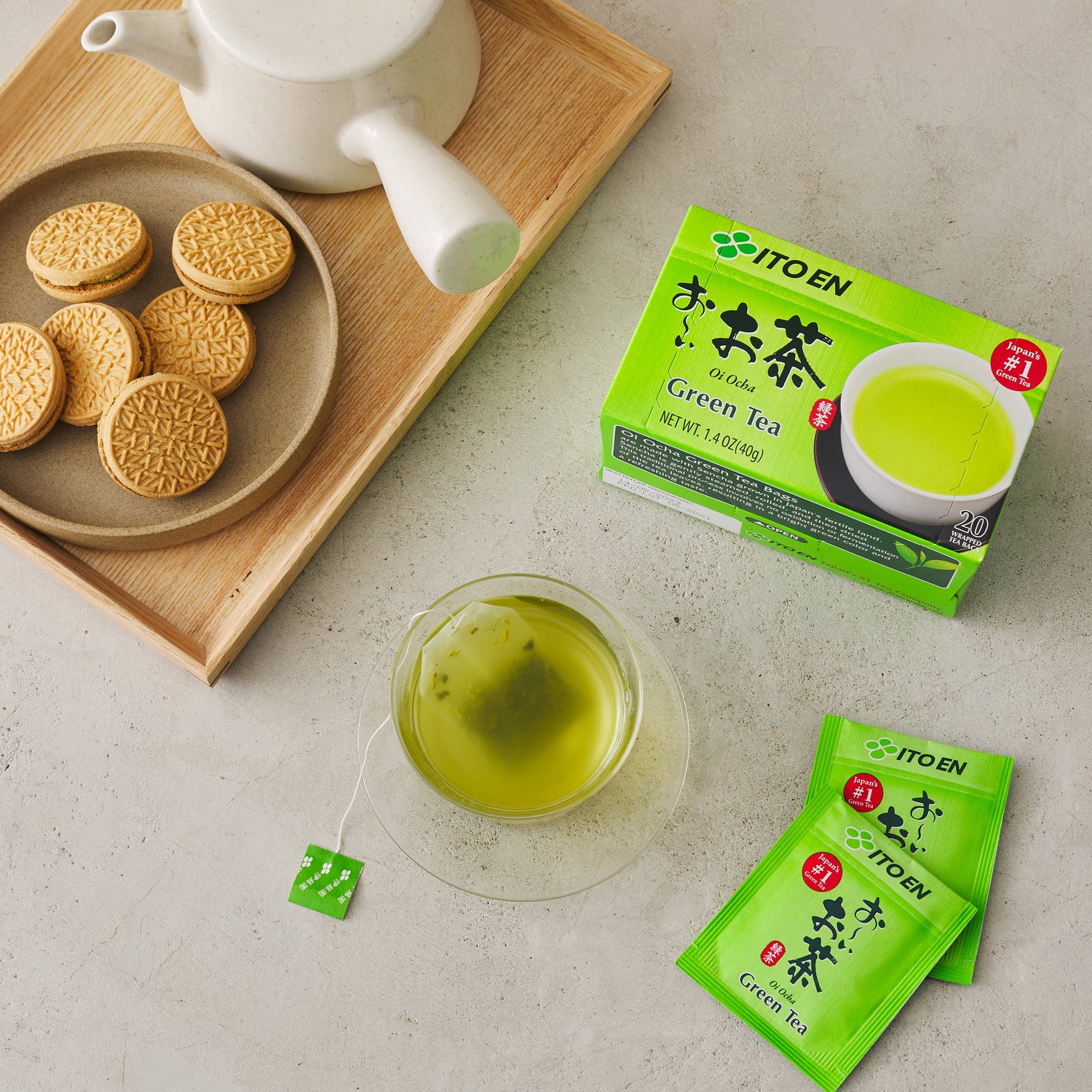 A cup of ITO EN Matcha Green Tea, and tea bag.