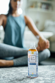 Women doing yoga with Teas' Tea Jasmine unsweetened green tea