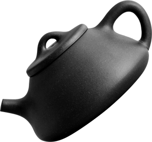 A floating teapot, about to pour water into the teacup